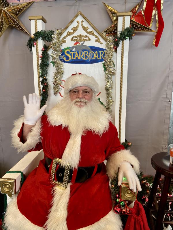 Santa is ready to hear childrens’ Christmas wishes.
